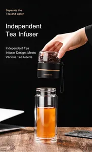 Close-up of double-layer glass tea bottle with separation infuser for loose leaf tea