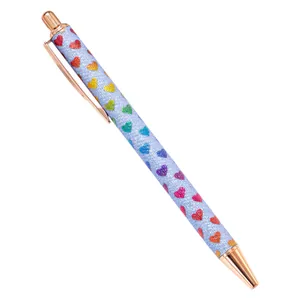 Retractable glitter ballpoint pen with rainbow heart pattern and rose gold accents