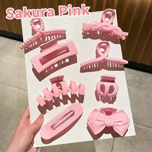 Elegant set of seven premium hair claw clips in stylish sakura pink for women