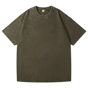 Detail view of a heavyweight 230g vintage washed olive green pure cotton unisex T-shirt