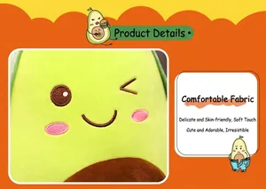 Close-up of soft green fabric and cute embroidered face on avocado plush toy