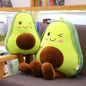 Cute avocado plush toys for kids, set of two soft fruit pillows in a cozy home setting
