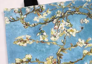 Detailed macro view of Van Gogh Almond Blossom print on durable blue canvas tote bag