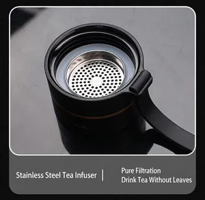 Close-up detail of the durable 304 stainless steel tea infuser inside the black cup
