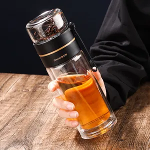 Portable double-wall glass tea infuser bottle with creative tea-water separation design