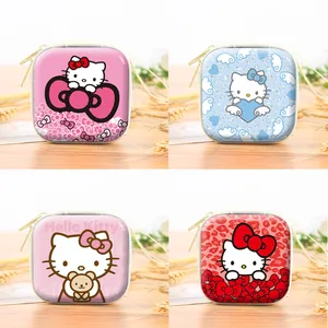 Macro view of four colorful Hello Kitty tinplate square zipper coin purses.