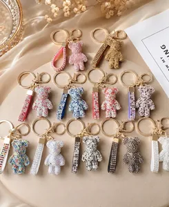 Exquisite collection of colorful rhinestone-studded bear keychains used for stylish bag charms