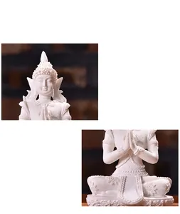 Detailed view of a Zen Southeast Asian Buddha statue with fine resin texture.