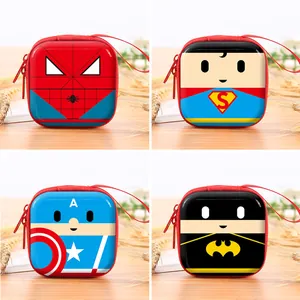 Detailed view of four superhero-themed square tinplate storage cases for earphones