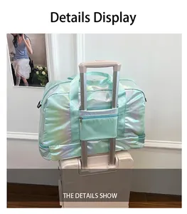 Iridescent mint green travel bag with luggage sleeve detail