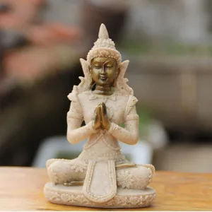 Detailed macro view of a mini Southeast Asian sandstone Buddha statue for Zen home decor