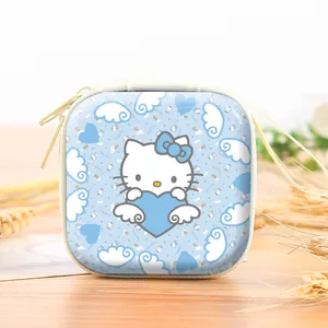 Close-up of a blue square tinplate coin purse featuring a cute kitten cartoon character