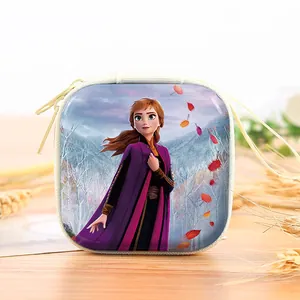 Detail of square tinplate storage bag featuring a colorful character print on the front