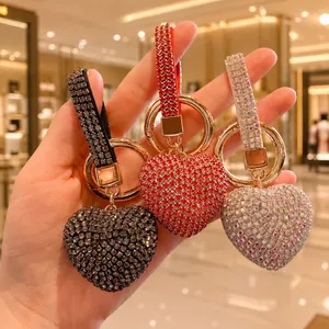 Elegant heart-shaped keychains with full rhinestone claw chains in black red and silver