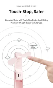 Detail of pink portable mini fan with soft safety blades and touch-stop feature