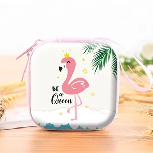 Macro detail of the cute flamingo pattern and pink zipper on a square tin storage case