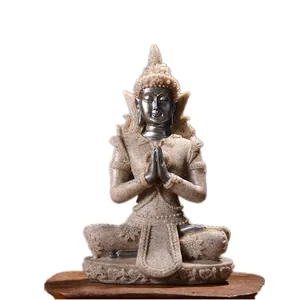 Zen Southeast Asian resin Buddha figurine with sandstone finish for home shelf decoration
