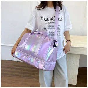 Detailed lifestyle view of a large iridescent purple gym bag with dry-wet separation
