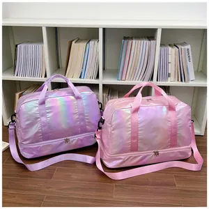 Pair of holographic iridescent duffel bags with dry-wet separation in a home setting.