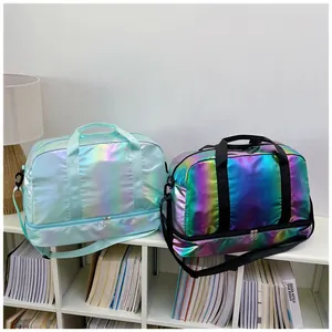 Close-up detail of two iridescent holographic gym bags with separate shoe compartments