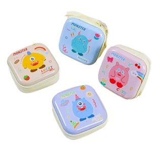 Set of 4 cute square tinplate coin purses with monster illustrations and zippers