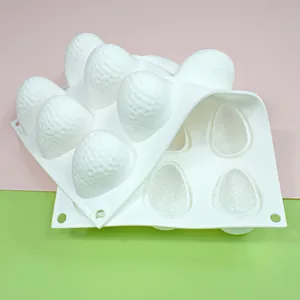 Close-up detail of strawberry-shaped cavities in a premium white silicone cake mold