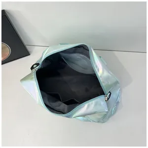 Detailed view of the large capacity holographic gym bag's internal compartments.