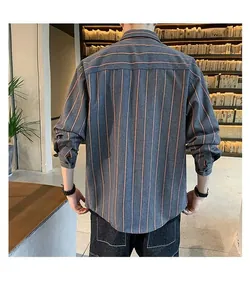 Rear view of a men's loose-fit vertical striped long-sleeve shirt in grey and orange color.