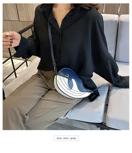 Cute cartoon whale-shaped crossbody bag in blue and white color contrast design