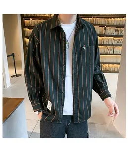 Men's loose dark green vertical striped long-sleeve casual shirt in library setting