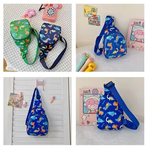 Detailed view of children's cartoon dinosaur chest bag with adjustable strap
