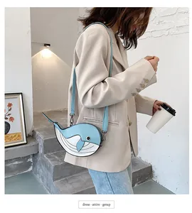 Stylish and cute whale-shaped cartoon crossbody bag featuring a unique color-contrast design