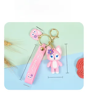 Detail of pink LinaBell fox keychain showing precise dimensions and silicone strap