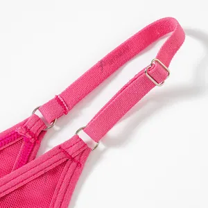 Close-up of pink breathable mesh thong with adjustable thin straps for women