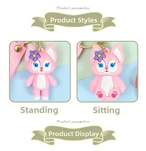 Close-up detail of cute pink fox character keychains in standing and sitting poses