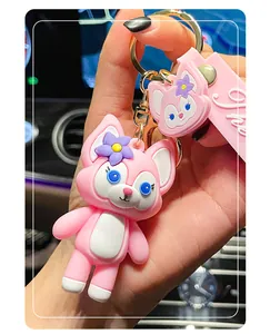 Close-up of pink LinaBell silicone keychain pendant with flower detail