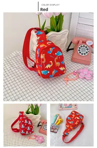 Detail view of red children's chest bag featuring cute cartoon dinosaur patterns