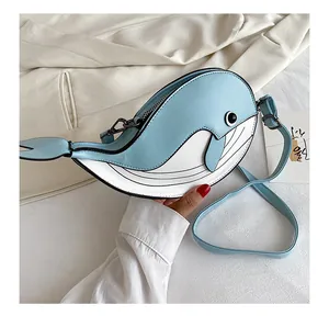 Adorable blue and white whale-shaped cartoon crossbody bag with adjustable strap