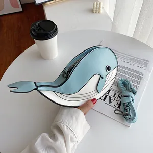 Cute cartoon blue and white whale-shaped crossbody bag with a detachable shoulder strap