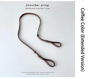 Detail view of a premium adjustable coffee brown PU leather shoulder strap for bags