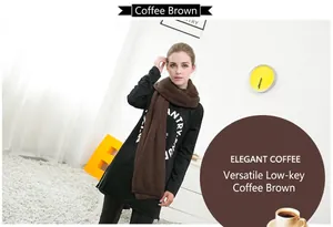 Female model wearing a cozy dark brown solid color winter scarf in a bright room