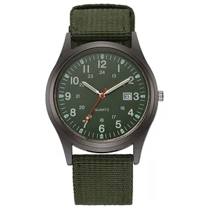 Detailed macro view of an army green military quartz watch with canvas strap