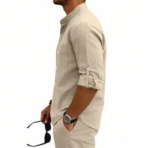 Macro detail of men's beige linen shirt featuring stand collar and rolled-up sleeves