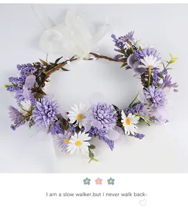 Close-up detail of ethereal lavender and daisy floral crown bridal headpiece for weddings