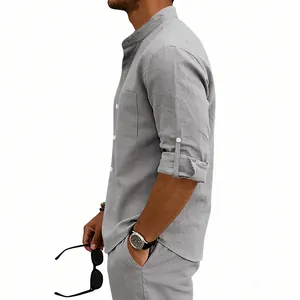 Side view of grey linen stand collar shirt with rolled sleeves and chest pocket