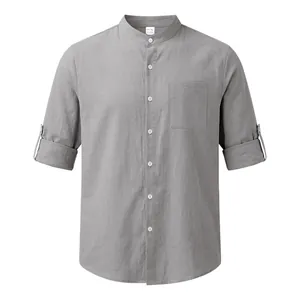 Detail of gray men's linen-cotton blend shirt featuring mandarin collar and chest pocket