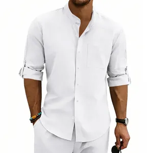 Detail of white linen stand-collar shirt with rolled-up sleeves and chest pocket for men