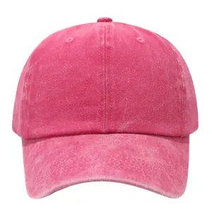 Frontansicht einer rosa gewaschenen Baumwoll-Baseballkappe mit Distressed-Look
