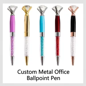 Set of five elegant metal ballpoint pens with large diamond tops and glitter barrels.
