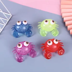 Set of four colorful TPR squeeze crab toys with big bulging eyes for stress relief and fun